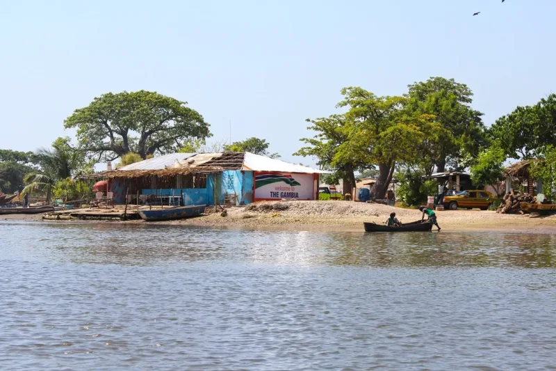 river scene, gambia, fishing village