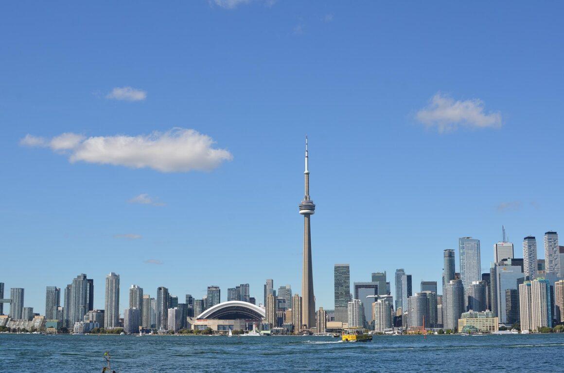 Toronto skyline from the water with the iconic CN Tower, Rogers